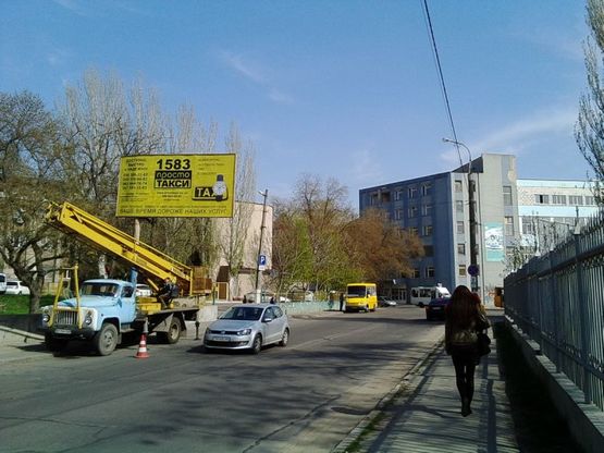 Фото рекламної площини за адресою Угол ул.Рабочая и ул.Декабристов (р-н банка)