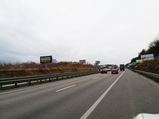 Фото рекламной плоскости по адресу Житомирская трасса  22,500 км  - Стоянка - в направлении Житомира