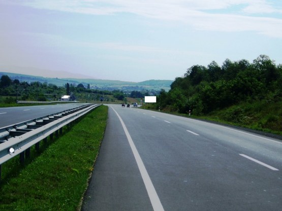 Фото рекламной плоскости по адресу Автодорога "Київ-Чоп", 1500 м від повороту в с. Р.Комарівці