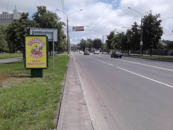 Фото рекламной плоскости по адресу ул.Г.Сталинграда (переход библиотека)