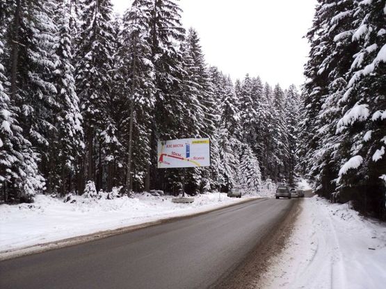 Фото рекламной плоскости по адресу Траса Н-09 Мукачево-Львів, дорога від Буковеля до Івано-Франківська (с.Поляниця),  850 м перед перехрестям з трасою, напрямок руху на Івано-Франківськ