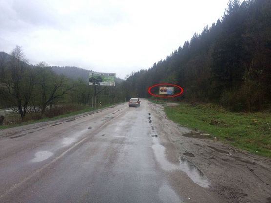 Фото рекламної площини за адресою Траса Н-09 Мукачево-Львів, в`їзд в село, перед санаторієм МВД, напрямок руху на Буковель