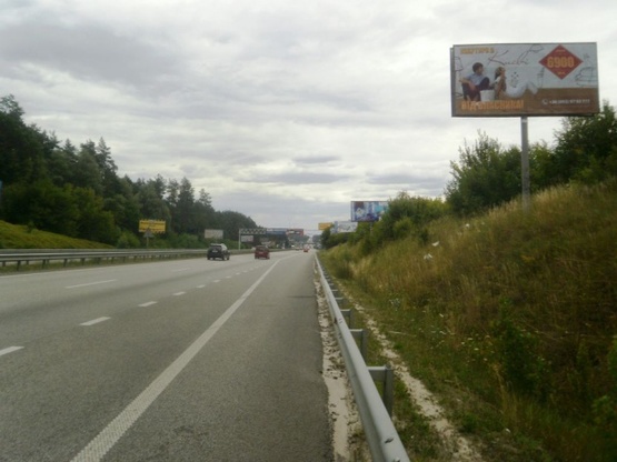 Фото рекламной плоскости по адресу Житомирская трасса 22,500 км - Стоянка - в направлении Киева