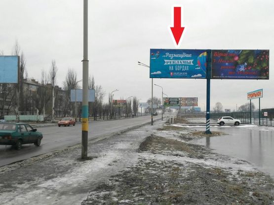 Фото рекламной плоскости по адресу ул. Днепровская, 129( Центр, поворот на ул.Богуна Ивана)