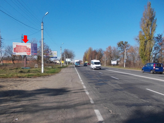 Фото рекламної площини за адресою Винницкое шоссе, возле магазина "Лезнево", въезд в город