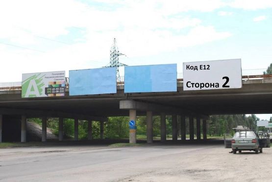 Фото рекламной плоскости по адресу Елизаветовское шоссе в сторону Левого берега (спуск с  Нового моста)