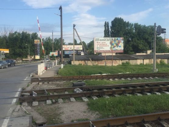 Фото рекламної площини за адресою Ж.переезд с ул.Паровозной на Бериславское ш.