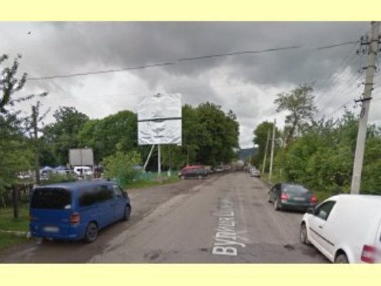 Фото рекламної площини за адресою вул.Шухевича(біля Торговиці) верхній