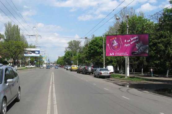 Фото рекламної площини за адресою Космонавтів вул., 11Б