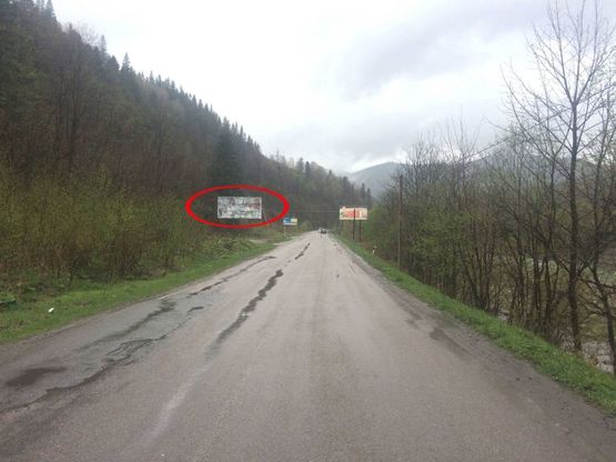Фото рекламної площини за адресою Траса Н-09 Мукачево-Львів, виїзд з села, напрямок руху на Івано-Франківськ
