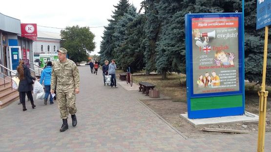 Фото рекламної площини за адресою ул. Шевченко, площадь около магазина "Торговый центр"