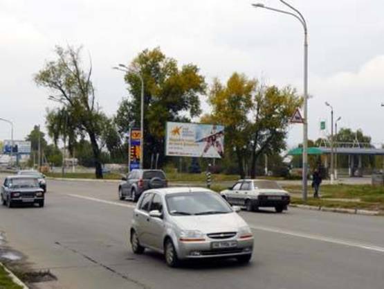 Фото рекламной плоскости по адресу ул. Днепровская (АЗС "Сентоза" , СТО "Аркада")