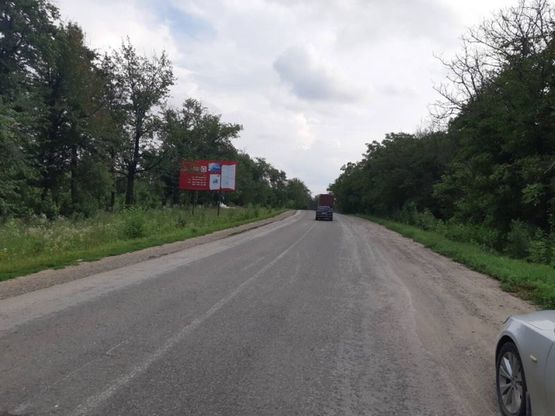 Фото рекламної площини за адресою смт. Кельменці, біля в*їздного знака смт. Кельменці