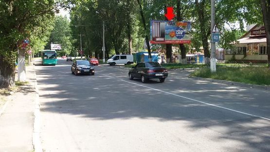 Фото рекламної площини за адресою Курчатова ул., 1, возле магазина "Вопак"