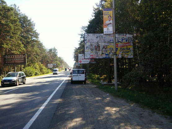 Фото рекламної площини за адресою ул. Шевченка, направление Буча-Киев, возле Деревяного рынка