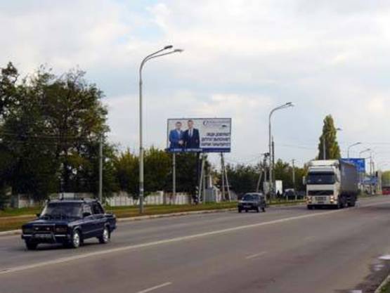 Фото рекламной плоскости по адресу ул. Днепровская,361 - ул.Славянская (РТС, СШ№20)