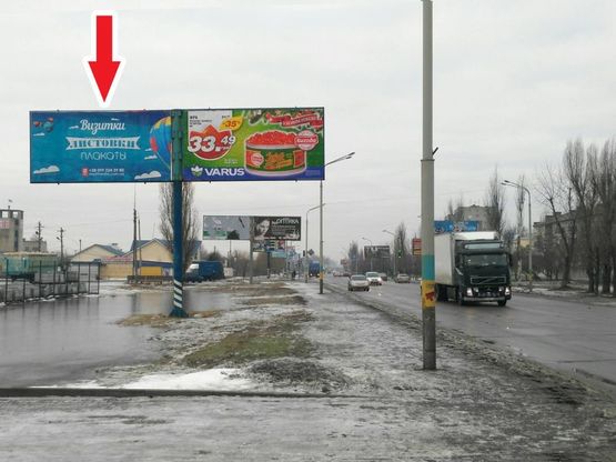 Фото рекламной плоскости по адресу ул. Днепровская, 129( Центр, поворот на ул.Богуна Ивана)