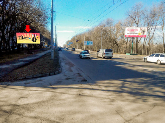 Фото рекламной плоскости по адресу Львовское шоссе, 47, возле вещевого рынка
