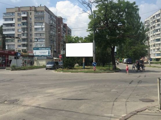 Фото рекламной плоскости по адресу Угол ул.Розы Люксембург и ул.Комкова,