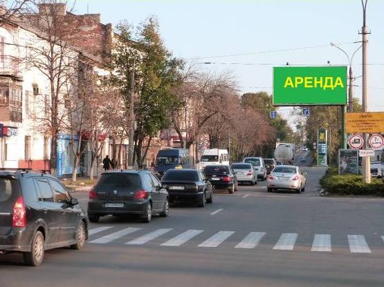 Фото рекламной плоскости по адресу ул. Небесной Сотни(ул.Пролетарская) 1а, район перекр. с ул. Николаевской (ул.Артёма), возле супермаркетов «Billa», «АТБ», «Эльдорадо», «ЭКОмаркет» и Центрального рынка