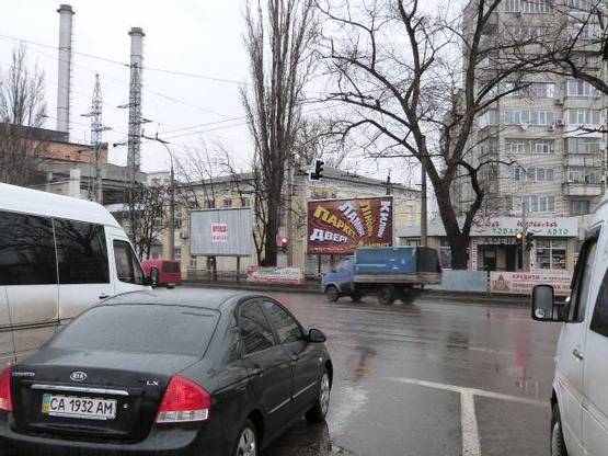 Фото рекламной плоскости по адресу просп. Свободы (ул.60л.Октября), 8а, перекр. с ул. Троицкой (Красина) и ул. Хорольской, возле Электростанции, напротив супермаркета «АТБ»