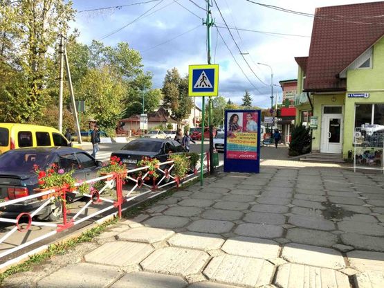 Фото рекламної площини за адресою Чороновола, центральний Універмаг, міський ринок, напрямок руху на Яремче, Буковель