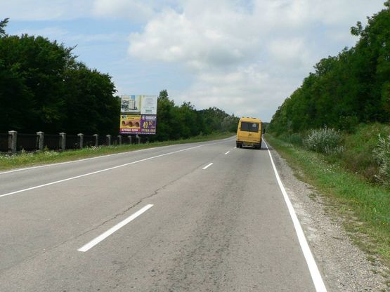 Фото рекламной плоскости по адресу Траса Івано-Франківськ-Богородчани-Надвірна, виїзді з Надвірної на Богородчани, напрямок руху на Івано-Франківськ (верх)