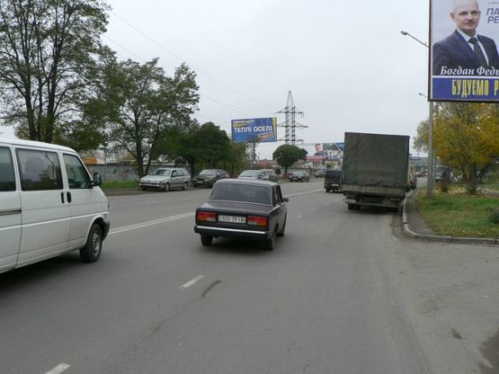 Фото рекламной плоскости по адресу Довженка (Мазепи супермаркети Велес, Comfy) АЗС ТНК, авторинок, Льодова Арена, АЗС WOG, напрямок руху від вул.Коновальця (АЗС ОККО, супермаркет ВелМарт)  в напрямку Мазепи (Набережна)
