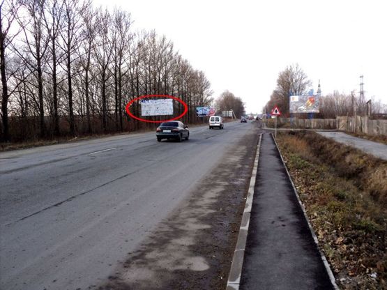 Фото рекламной плоскости по адресу Калуське шосе (виїзд з міста, АЗС WOG), напрямок руху зі сторони вул.Галицька в напрямку м.Калуш