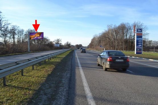 Фото рекламной плоскости по адресу Трасса Киев-Харьков-465 км-пос. Коротыч возле АЗС ТНК- в ст. Люботина