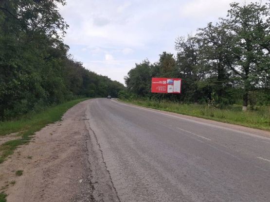 Фото рекламной плоскости по адресу смт. Кельменці, біля в*їздного знака смт. Кельменці