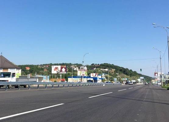 Фото рекламної площини за адресою Дніпровське шосе, поворот на с. Лісники, траса Н-01 "Київ-Знам'янка", км 20+850 право, біля "АТБ"