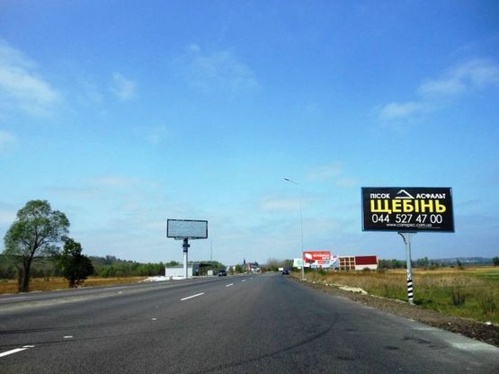 Фото рекламной плоскости по адресу Дніпровське шосе, возле ресторана "Караван"; км 24+800 лево