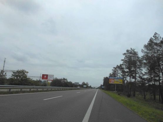 Фото рекламної площини за адресою Новообухівська траса 35+600 ліворуч