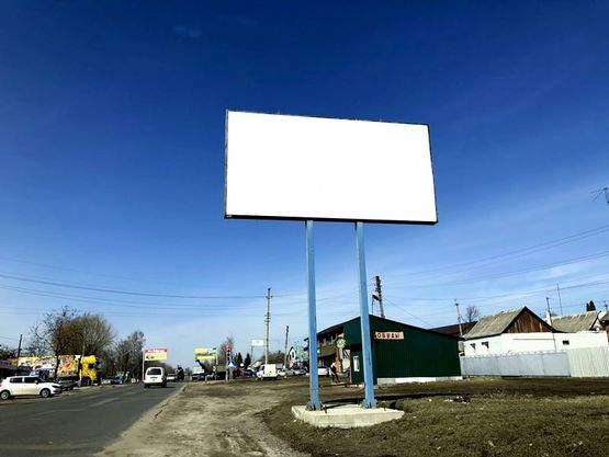 Фото рекламной плоскости по адресу Находится на автодороге Харьков - Симферополь (М18) (слева от дороги), по ул. Днепропетровская, на противоположной стороне от Мерефянской ЦРБ (автобусная остановка «Больница»).