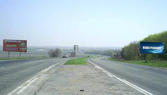Фото рекламной плоскости по адресу р-н оптового овощного рынка и на въезде в г. Славянск (направление на Славянск)