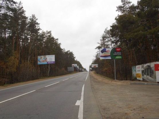 Фото рекламной плоскости по адресу м. Буча, траса М07, км 24+750 право, вул. Шевченка, виїзд з Гостомеля в Бучу,  500м за разв'язкой Ірпінь -Гостомель