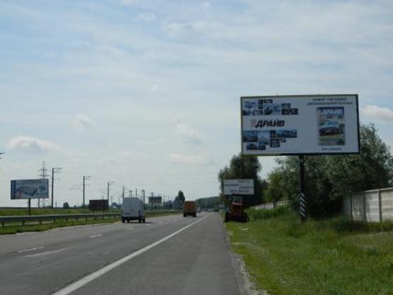 Фото рекламної площини за адресою Новообуховская трасса 22+200 справа из Киева
