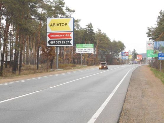 Фото рекламної площини за адресою м. Буча, траса М07, км 24+600 право, вул. Шевченка, заїзд до ЖК "Авіатор", виїзд з Бучі в Ірпінь, Гостомель,  перед разв'язкою Ірпінь - Гостомель- Київ
