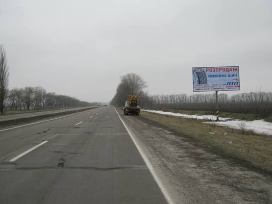 Фото рекламної площини за адресою Въезд в Решетиловку со стороны Полтавы (308км+800м)