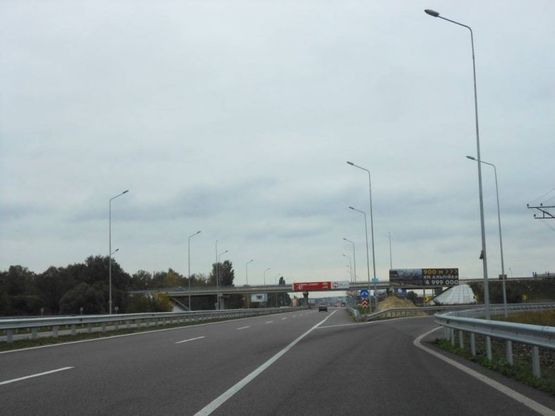 Фото рекламной плоскости по адресу Новообухівська траса, перед поворотом на c. Креничі, Ходосіївку, км 25+100 право