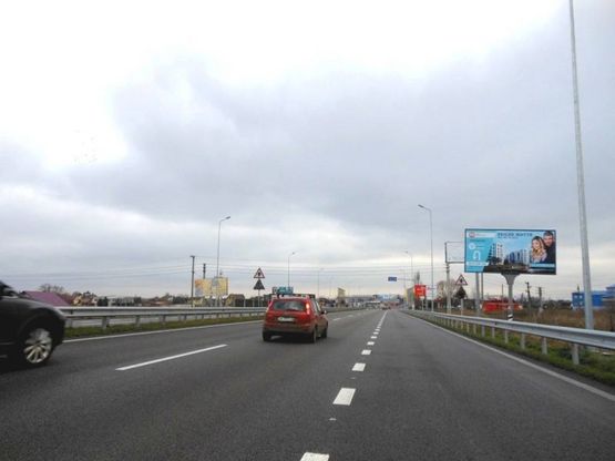 Фото рекламной плоскости по адресу Новообухівська траса, перед поворотом на с.Підгірці, км 26+000 право