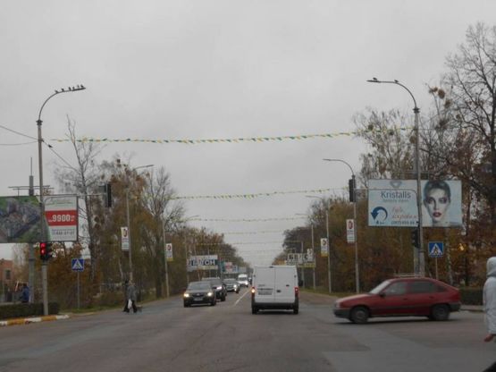 Фото рекламної площини за адресою м. Буча, траса М07, км 29+300 право, вул. Нове шосе,22, біля ресторану "Мі Амор", на світлофорі, ЖК "Гранд Бурже"