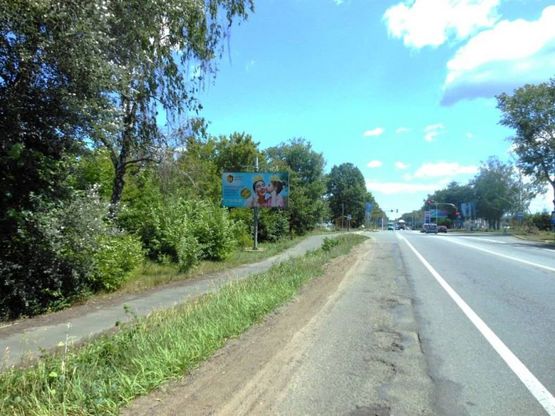 Фото рекламної площини за адресою м.Буча, траса М07, км 30+150 право,  вул. Нове Шосе- вул. Депутатська, за ТЦ Модуль, навпроти ТК Варшавський, ЖК "Буча-Квартал"