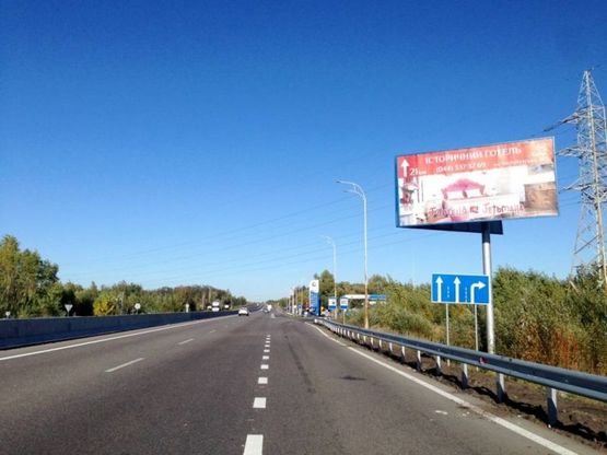 Фото рекламной плоскости по адресу смт. Калинівка, траса М-05 Київ-Одеса, км 33+990 ліво