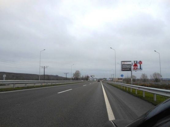 Фото рекламної площини за адресою Новообухівська траса, поворот на с.Креничі, км 25+100 лево