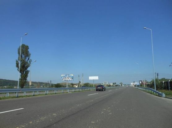 Фото рекламної площини за адресою Новообухівська траса, поворот на Підгірці, км 26+100 право