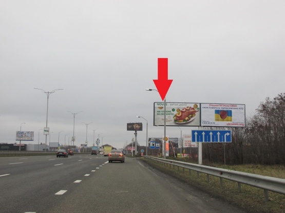 Фото рекламной плоскости по адресу Бориспольская трасса в г.Борисполь (32+300, за 30м.до съезда на заправку Shell), левая