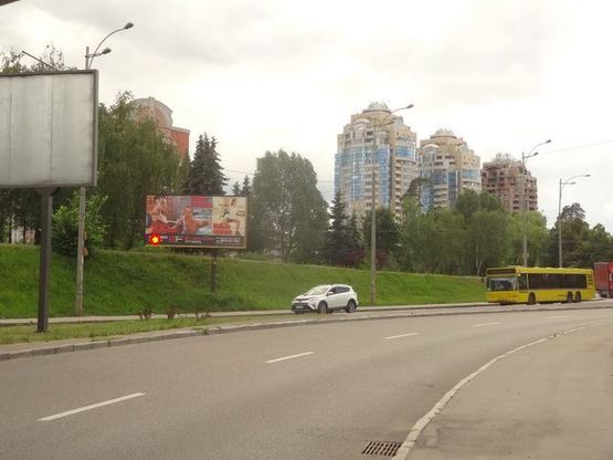 Фото рекламной плоскости по адресу Победы пр. - съезд с пр. Палладина на пр. Победы