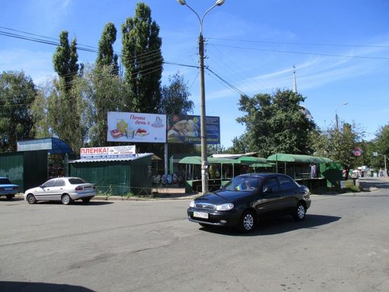 Фото рекламной плоскости по адресу ул. Комсомольская х ул. Муринсона (правый)